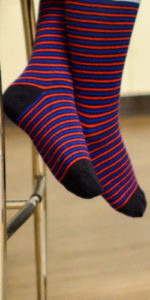 a person wearing striped socks