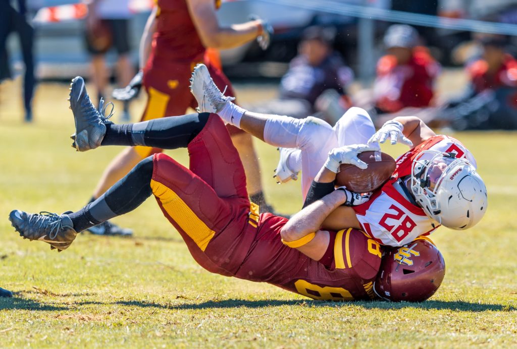 Football Players Tackling