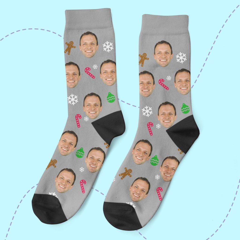 a pair of socks with a face on them