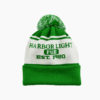 a green and white knit hat with a pom