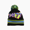 a black and yellow beanie with a pom