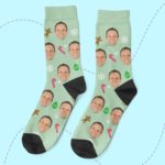 a pair of socks with a face on them