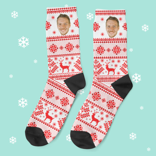 a pair of socks with a man's face on them