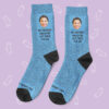 a pair of blue socks with a picture of a woman's face