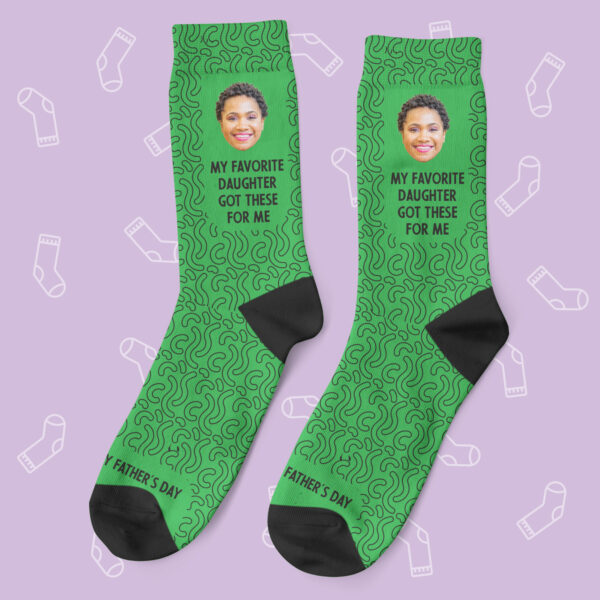 a pair of socks with a picture of a woman's face