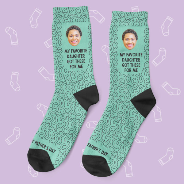 a pair of socks with a picture of a woman's face
