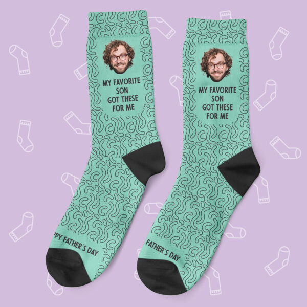 a pair of socks with a picture of a man on them