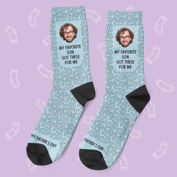 a pair of socks with a picture of a man on them