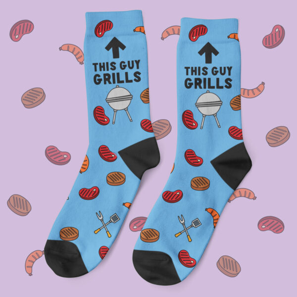 a pair of blue socks with images on them