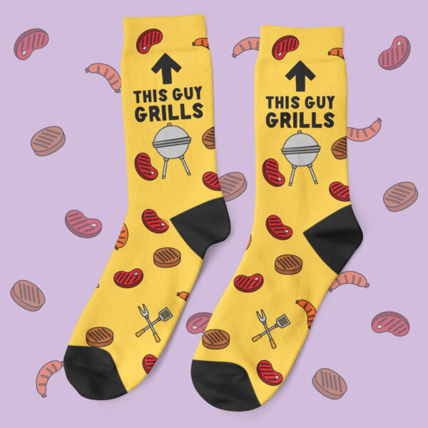 a pair of yellow socks with black text